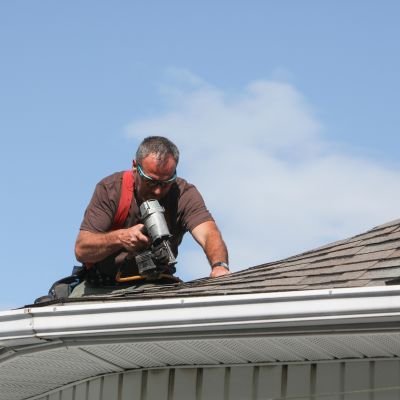 Legends roof inspector checking roof condition and structure