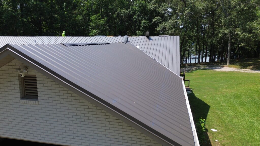 Roof Installation in Braselton, GA featuring new architectural shingles installed on a modern two-story home