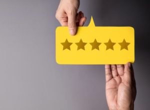 Customer giving five-star feedback for remodeling services – Legends Restoration and Group