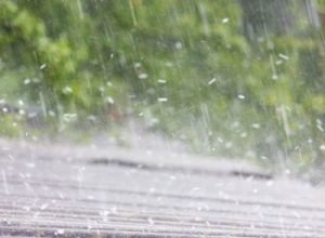 Water falling on roof, waterproofing and leak prevention by Legends Restoration and Group