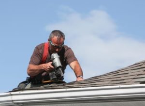 Legends roof inspector checking roof condition and structure