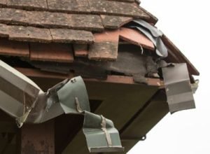Damaged gutter and roof edge, gutter repair service by Legends Restoration and Group